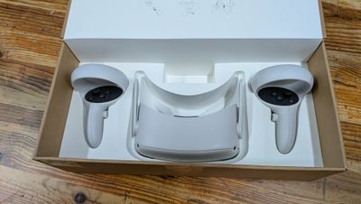 a white box with a pair of headphones inside of it