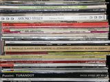 a lot of records stacked on top of each other