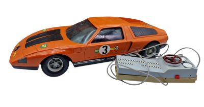 a toy car that is connected to a computer mouse