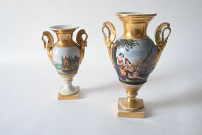 two vases that are sitting next to each other on a table