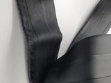 a close up of a pair of black shoes on a chair