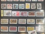 a picture of a collection of stamps on display in a case