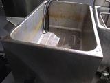 an image of a dirty sink in a commercial kitchen
