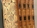five books that are sitting on top of each other