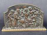an image of a bronze sculpture of a group of people on horseback
