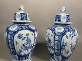 pair of chinese blue and white vases with lids