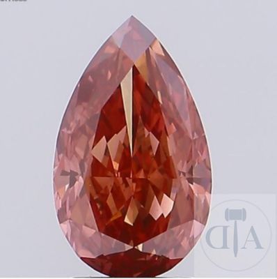un losange orange dont la face a la forme d'une larme, sur fond blanc