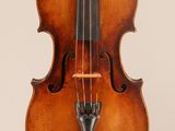 an old violin with a bow on a white background