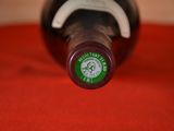 a close up of a bottle of wine on a table