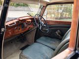 a view of the dashboard of an old car
