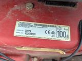 an image of a close up of a red machine