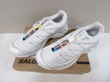 pair of new balance shoes in a box on a white surface