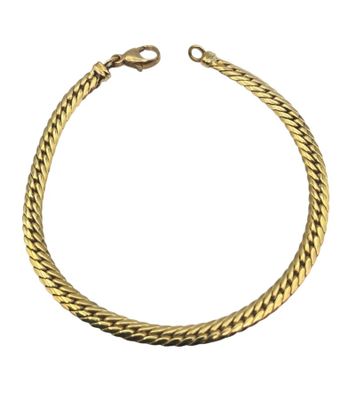 une image d'un bracelet en or sur fond blanc