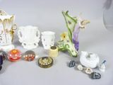 many different types of vases on the table