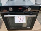 a black oven with a digital clock on top of it
