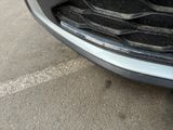 a close up of the front bumper of a car