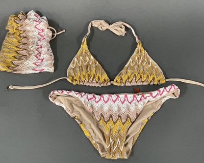 two pieces of swimsuit with a drawstring and a drawstring bag