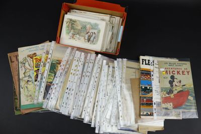beaucoup de livres dans une boîte sur la table