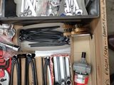 a box full of tools that are sitting on a table