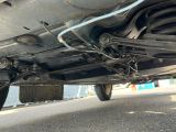 a close up view of a car ' s exhaust pipe and exhaust pipe