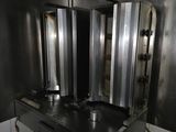 an image of a commercial kitchen with stainless steel appliances
