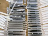 a lot of pens that are sitting on a table