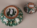 two bowls that are sitting on a table