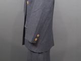 an image of a suit and skirt on a mannequin stand
