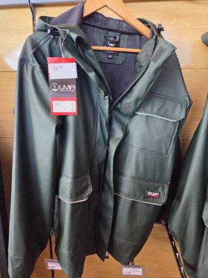 two jackets hanging on a rack in a store