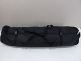 duffel bag on a white table with a white background
