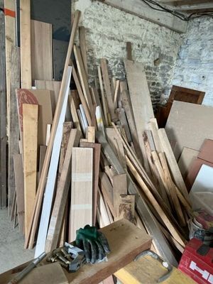 a pile of wood sitting on a table in a room