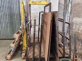 several pieces of wood are stacked on a pallet in a warehouse
