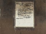 a piece of paper with writing on it sitting on a table