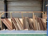 a large pile of cardboard in a storage area