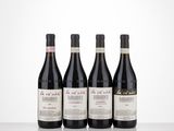 three bottles of wine sit on a table with a white background