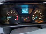 a close up of a car dashboard with a speedometer and gauges