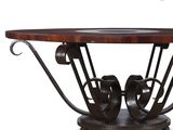 an image of a wooden table with metal legs and a glass top