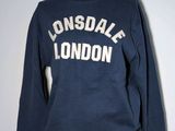 an image of a blue sweatshirt with the word lonsdale london on it