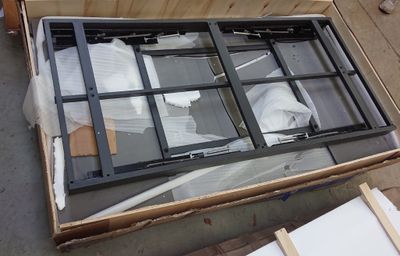 a box that has a window in it on the floor