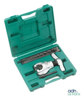 a close up of a tool in a green case on a white background