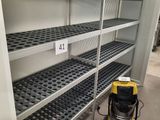 a machine that is sitting on a shelf in a room