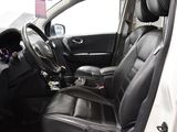 a picture of the inside of a car with black leather seats
