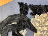 two pieces of clothing that are laying on a table