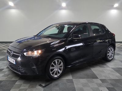 a picture of a black car parked in a garage