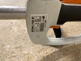a close up view of the handle of a chainsaw