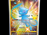a close up of a pokemon card on a stand on a black background