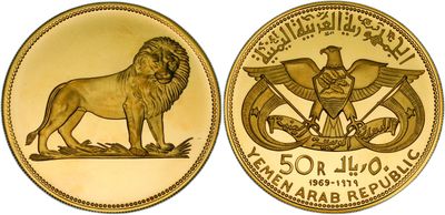 a close up of a gold coin with a lion on it