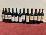 a group of bottles of wine sitting on top of a table