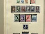 a picture of a framed picture of a collection of stamps