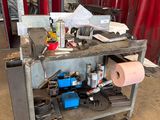 an image of a workbench in a garage with tools